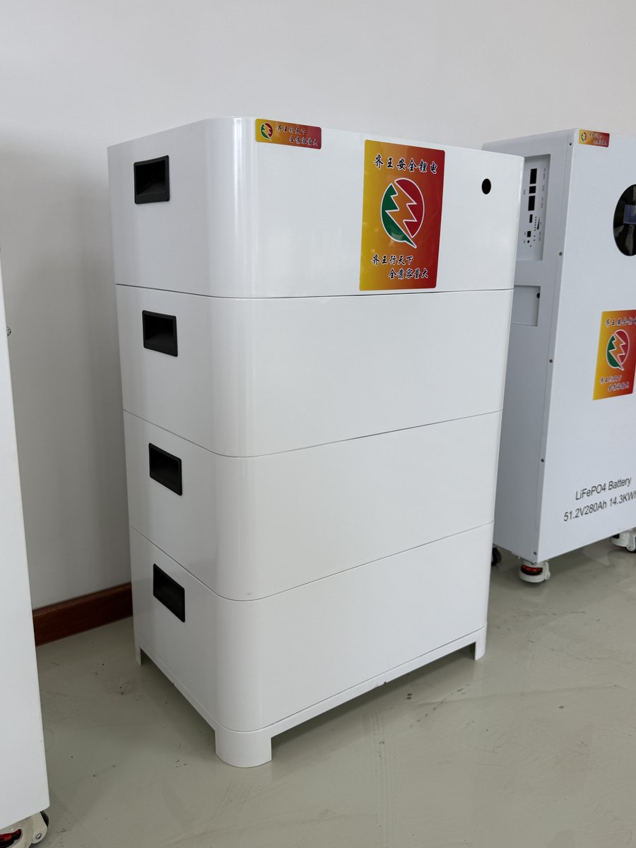 LiFePO4 storage modules staged on the workshop floor
